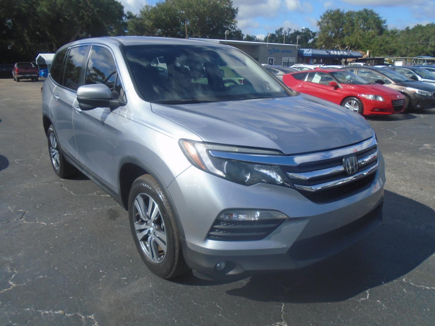 2016 Honda Pilot EX 2WD (5FNYF5H43GB) with an 3.5L V6 SOHC 24V engine, 6A transmission, located at 6112 N Florida Avenue, Tampa, FL, 33604, (888) 521-5131, 27.954929, -82.459534 - Photo#2